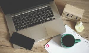 laptop beside a coffee